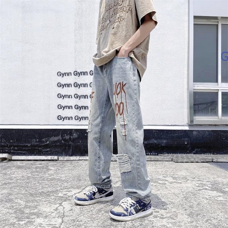 Herren Design Ripped Jeans Echoarchiv