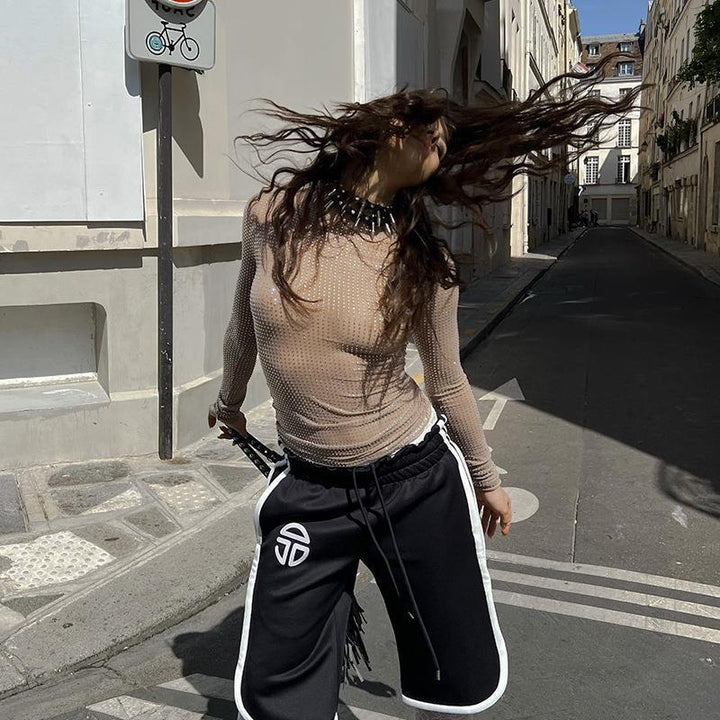 Damen Glitzerndes Langarmshirt mit figurbetontem Schnitt und transparentem Design Echo Archiv