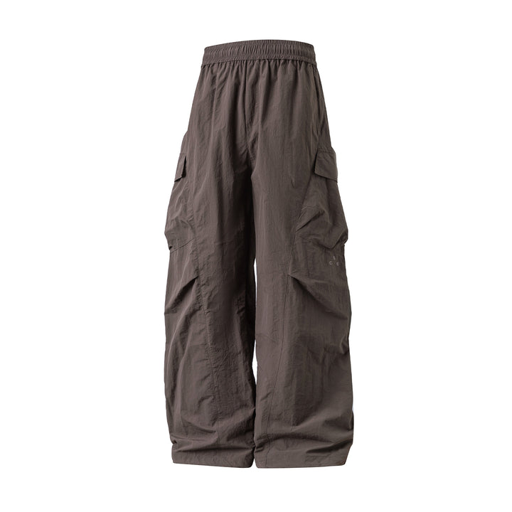 Unisex Extraweite Nylon‑Cargo‑Palazzohose mit elastischem Comfort‑Bund und asymmetrischen Klappentaschen Echo Archiv