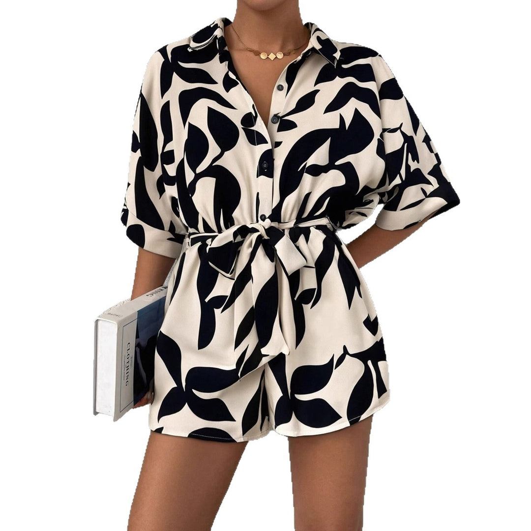 Damen Kurzärmliger Jumpsuit mit floralem Print und Taillengürtel Echo Archiv