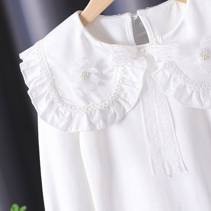 Mädchen Bluse mit rüschenverziertem Kragen und feinen Blumenapplikationen Echo Archiv