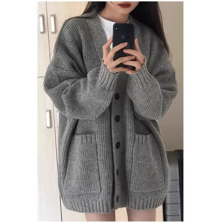 Damen Oversize Strickcardigan mit aufgesetzten Taschen und durchgehender Knopfleiste Echoarchiv