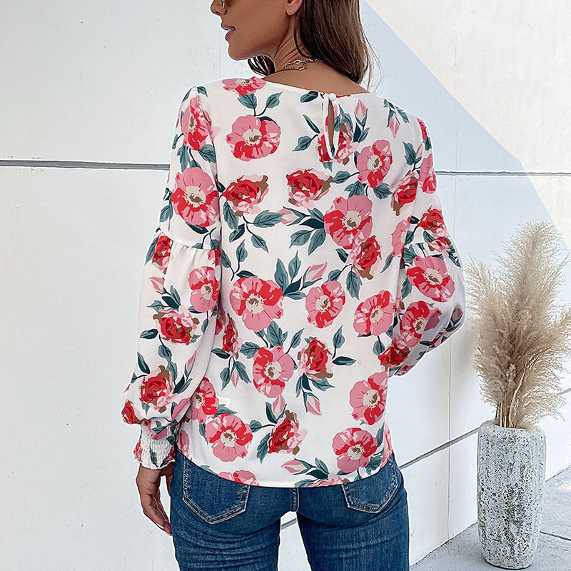 Damen Leichte Bluse mit großflächigem Blumenprint, Volumenärmeln und Smokbündchen Echoarchiv