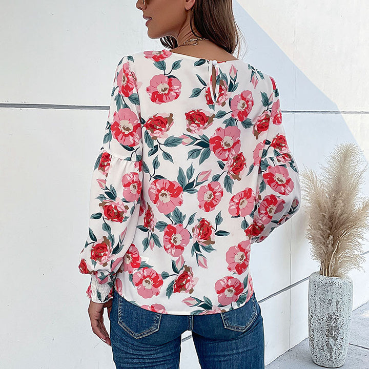 Damen Leichte Bluse mit großflächigem Blumenprint, Volumenärmeln und Smokbündchen Echoarchiv