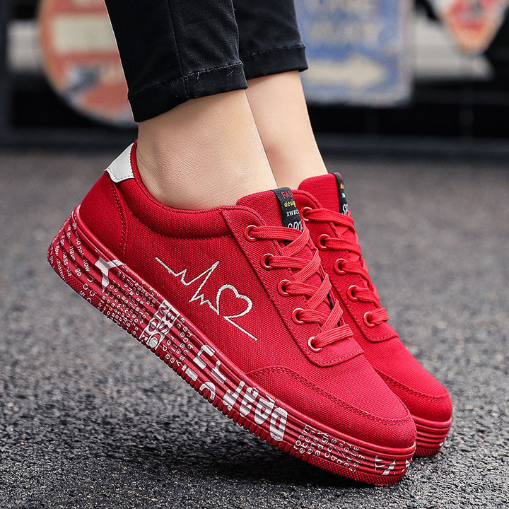 Damen nan Canvas-Sneaker mit dekorativer Print-Plateausohle und Herzlinien-Stickerei Echo Archiv