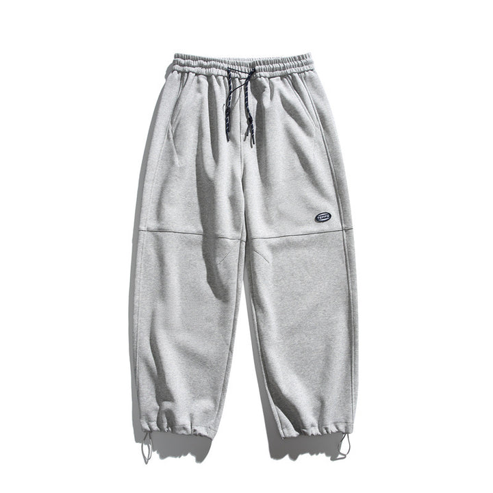 Unisex Lockere Cargo-Jogginghose mit Kordelzug, Knieabnähern und verstellbarem Saum Echoarchiv