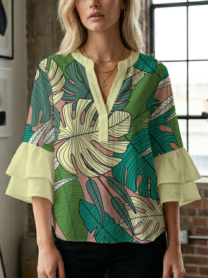 Damen Bluse mit voluminösen Flügelärmel und intensivem Blattmuster Echo Archiv