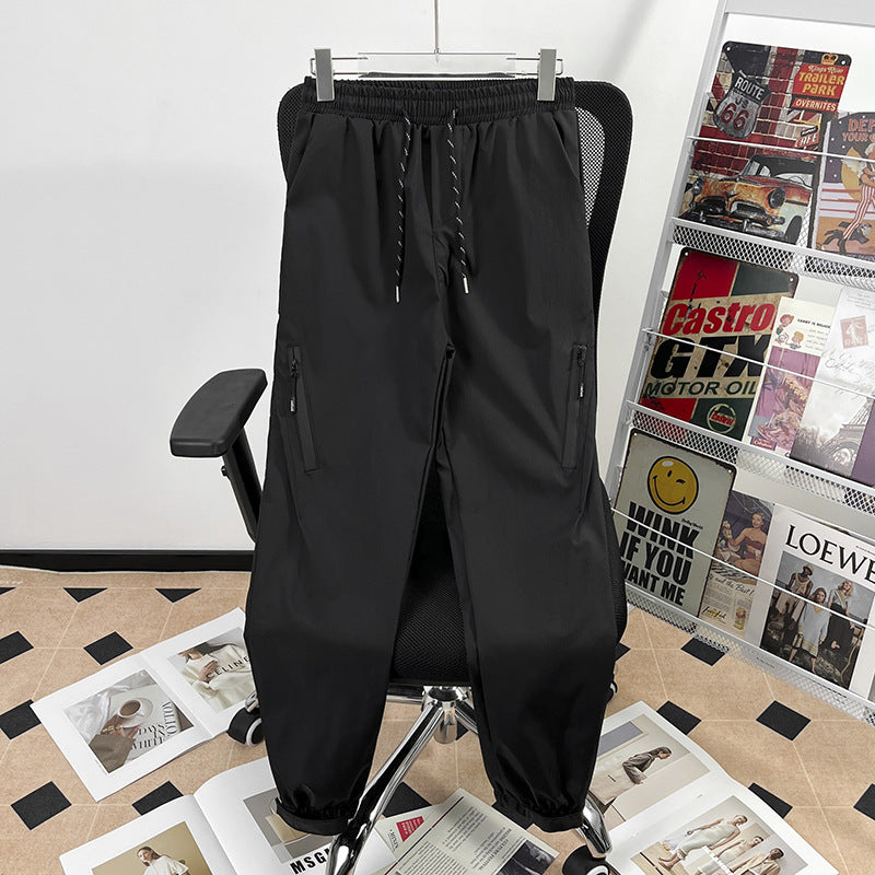 Unisex Sportliche Jogginghose mit verstellbarem Bund und Seitentaschen Echoarchiv