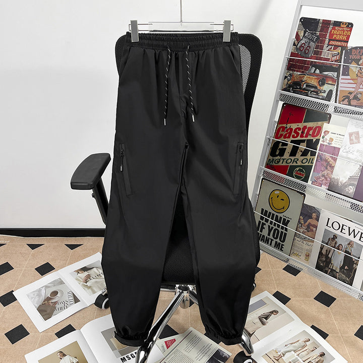 Unisex Sportliche Jogginghose mit verstellbarem Bund und Seitentaschen Echoarchiv
