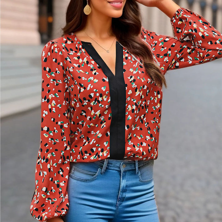 Damen Locker geschnittene V-Ausschnitt-Bluse mit kontrastierter Zierblende und Allover-Print Echoarchiv