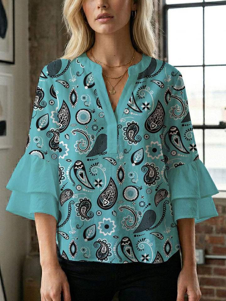 Damen Bluse mit voluminösen Flügelärmel und intensivem Blattmuster Echo Archiv