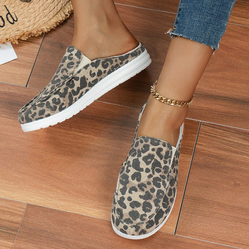 Damen  Slip-On Canvas‑Mules mit Kuhfleckenprint, gepolstertem Komfortfußbett und rutschfester Leichtsohle Echo Archiv
