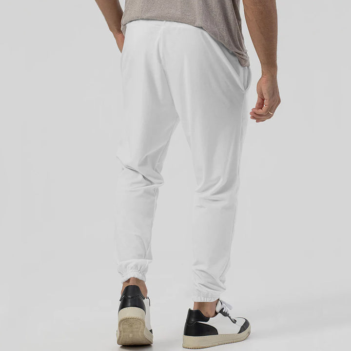 Herren Tapered-Jogginghose im Leinenlook mit Bügelfalte und Bündchen Echoarchiv