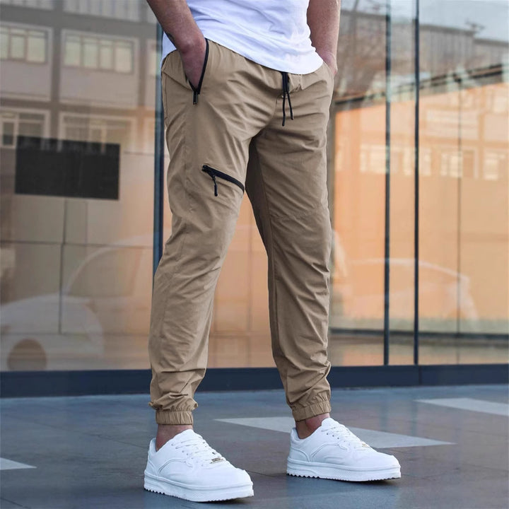 Herren leichte Sporthose mit seitlichen Reißverschlusstaschen Echoarchiv