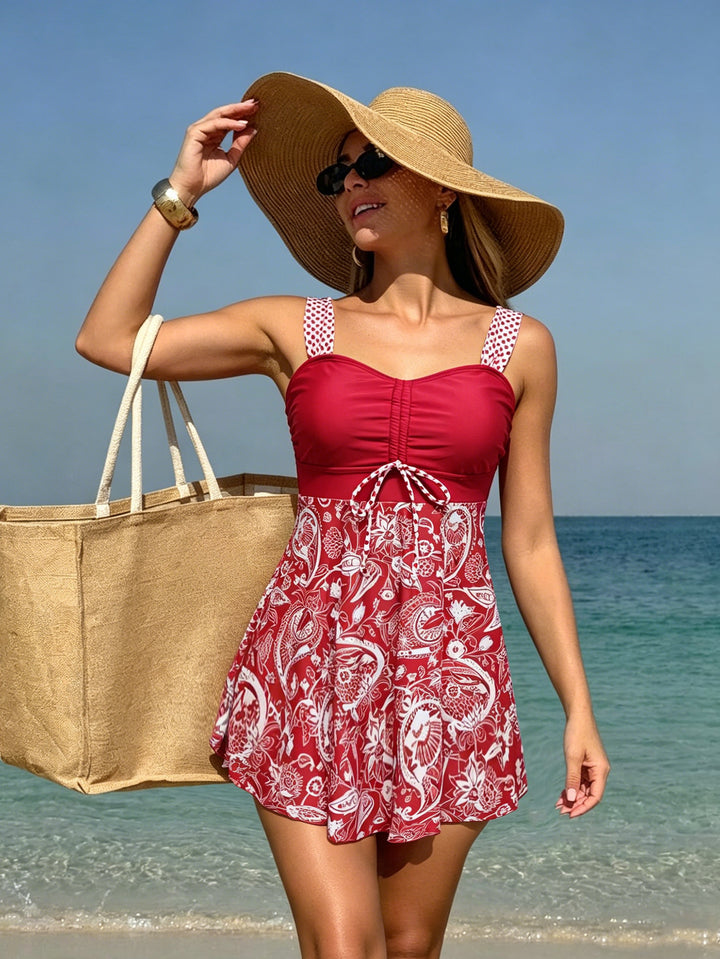 Damen Schwimmdress mit floralem Oberteil und lässigem Rock Echo Archiv
