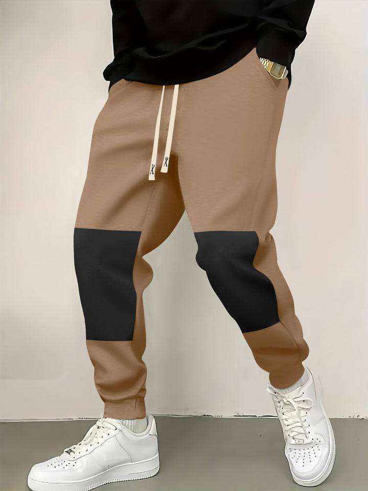 Herren elegante Sporthose mit modernen Farbblockelementen Echoarchiv