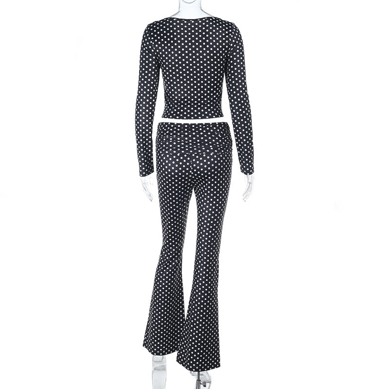 Damen figurbetonter Jumpsuit mit langen Ärmeln und Polka-Dot Muster Echo Archiv