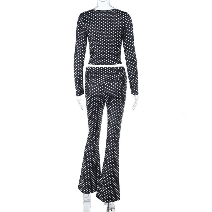 Damen figurbetonter Jumpsuit mit langen Ärmeln und Polka-Dot Muster Echo Archiv