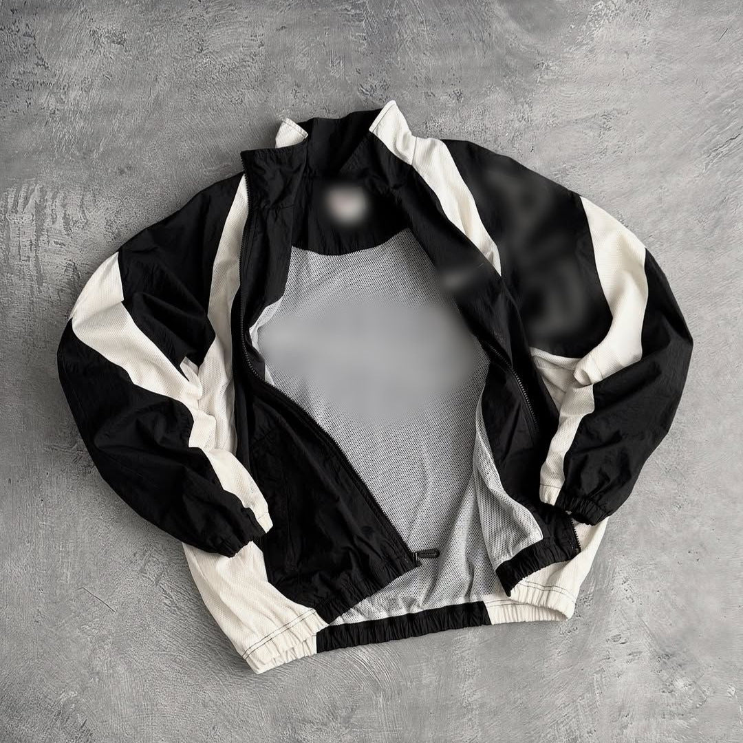 Unisex nan atmungsaktive leichte Wind- und Trainingsjacke mit Netzfutter, Stehkragen und elastischem Saum Echo Archiv