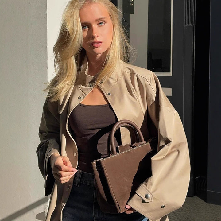 Damen Oversize Kurzmantel im Trench‑Look mit kastiger Silhouette und verdeckter Druckknopfleiste Echoarchiv