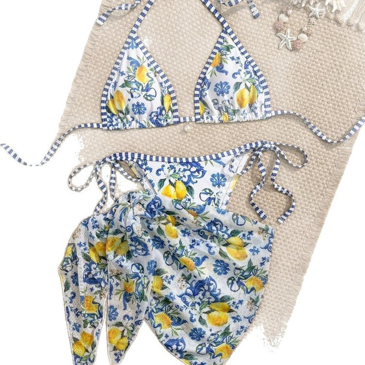 Damen Triangel-Bikini mit floralem Muster und verspieltem Pareo Echo Archiv