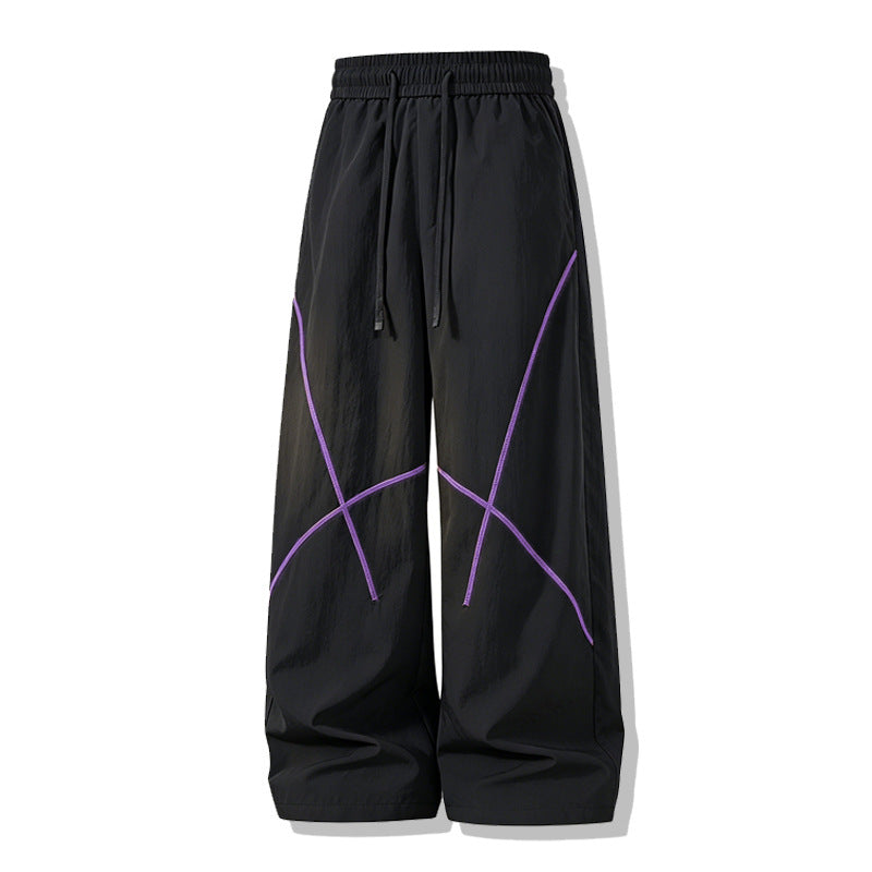 Herren Weite Funktions-Nylonhose mit Kordelbund, reflektierenden Nahtdetails & lässiger Baggy‑Silhouette Echoarchiv