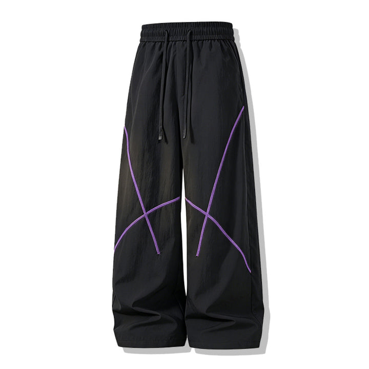 Herren Weite Funktions-Nylonhose mit Kordelbund, reflektierenden Nahtdetails & lässiger Baggy‑Silhouette Echoarchiv