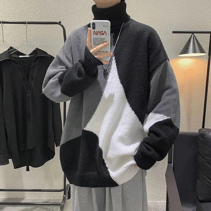 Herren Grobstrickpullover mit hohem Kragen und modernen Farbblocks Echoarchiv