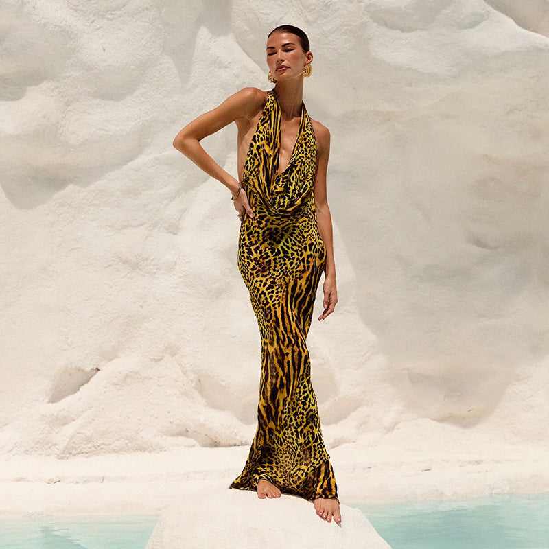 Damen Elegantes Tiermuster-Maxikleid mit tiefem Ausschnitt und fließendem Stoff Echo Archiv