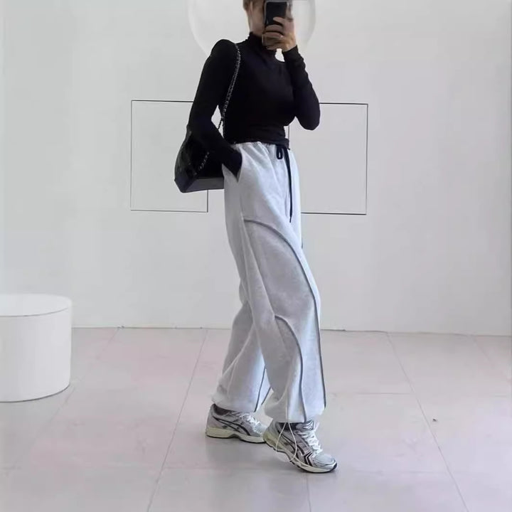 Damen Weite Sweatpants mit kontrastierenden Nahtdetails und Kordelzug – Avérine