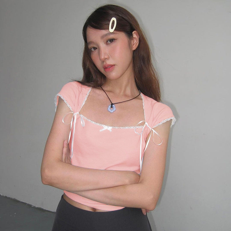Damen Crop-Oberteil mit verstellbaren Spaghettiträgern und eleganten Knoten-Details Echo Archiv