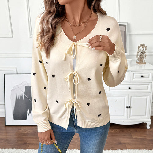 Damen Feinstrick-Cardigan mit dekorativen Schleifenverschlüssen und Herz-Motiv – Veloura