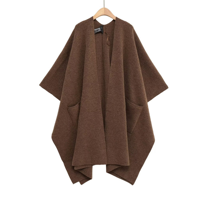 Damen Oversize Strickponcho mit Eingrifftaschen und asymmetrischem Saum Echo Archiv
