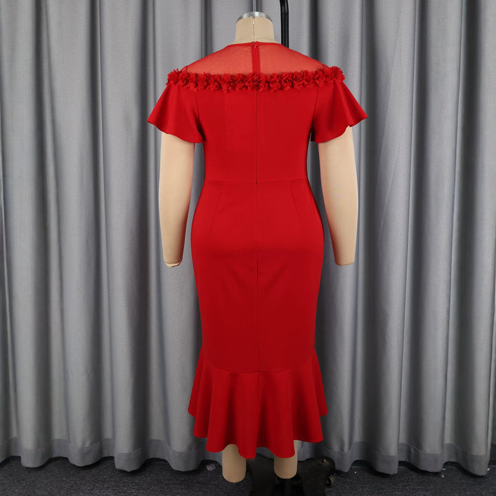 Damen Elegantes Kleid mit floralem Akzent und schwingendem Saum Echo Archiv