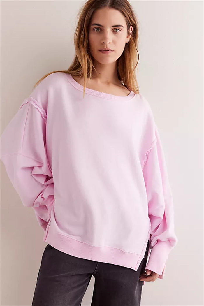 Damen oversized Sweatshirt mit Ballonärmeln, offenen Saumnähten und seitlichen Schlitzen – Avérine