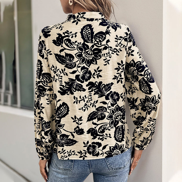 Damen Locker geschnittene Bluse mit Stehkragen, Kellerfalten und floralem Print – Élovi