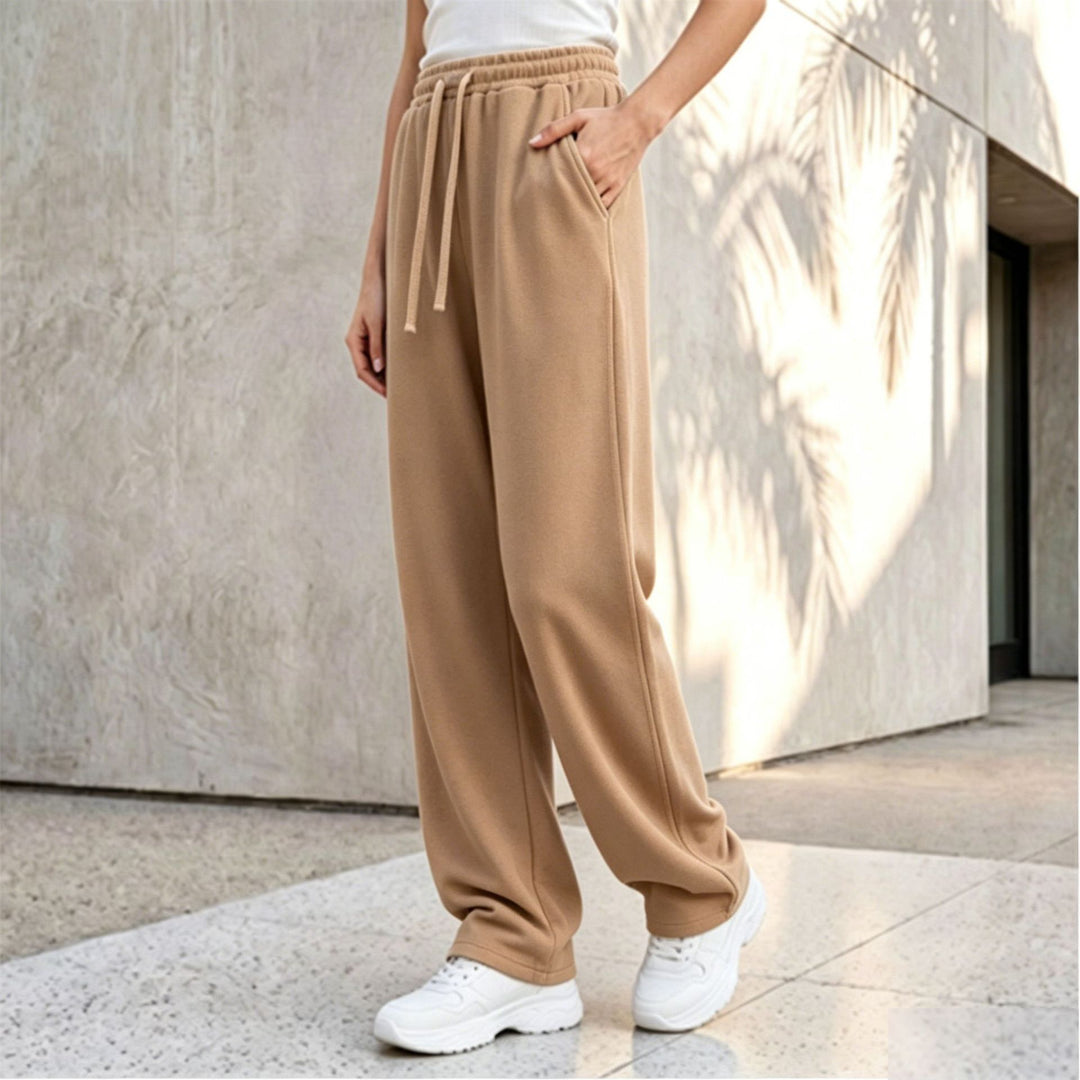 Damen nan weite Loungepalazzo-Hose mit hohem Komfortbund, Kordelzug, seitlichen Eingrifftaschen und dekorativer Seitennaht Echo Archiv