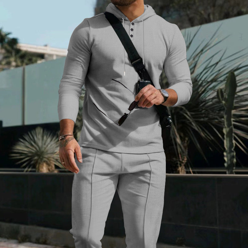Herren Kapuzenpullover mit Knopfdetail und sportlicher Passform Echoarchiv