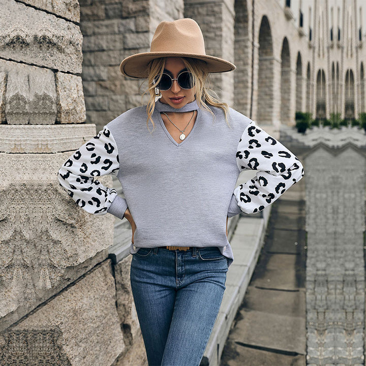 Damen Lässiger Pullover mit Leopardenärmel Echo Archiv
