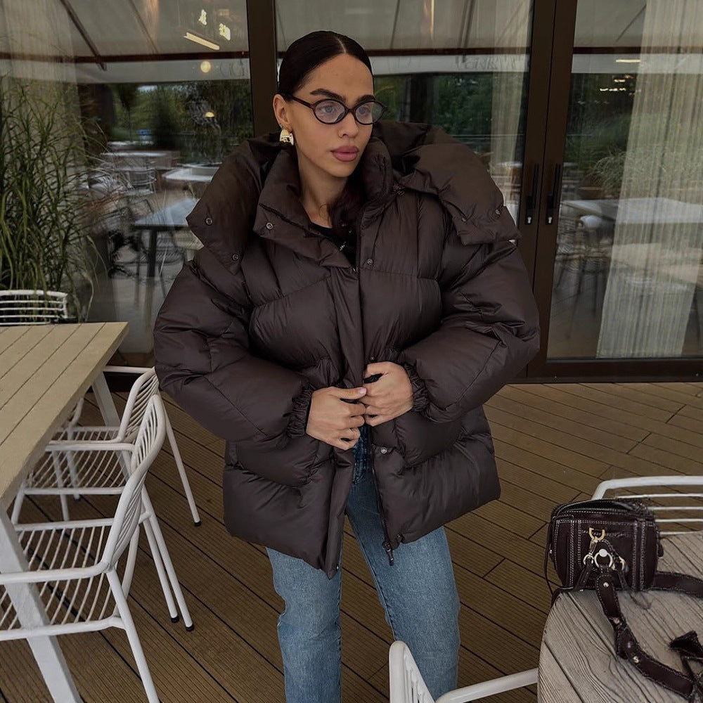 Damen Oversize Steppjacke mit hohem Schalkragen und wattierter Füllung Echoarchiv