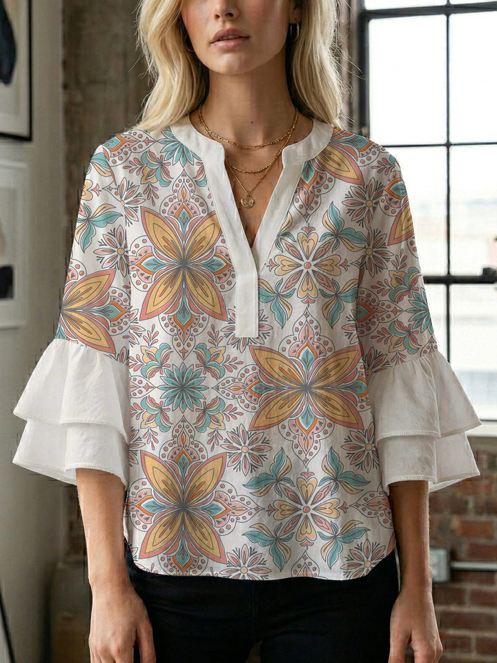 Damen Bluse mit voluminösen Rüschenärmeln und kreativem Floraldesign Echo Archiv