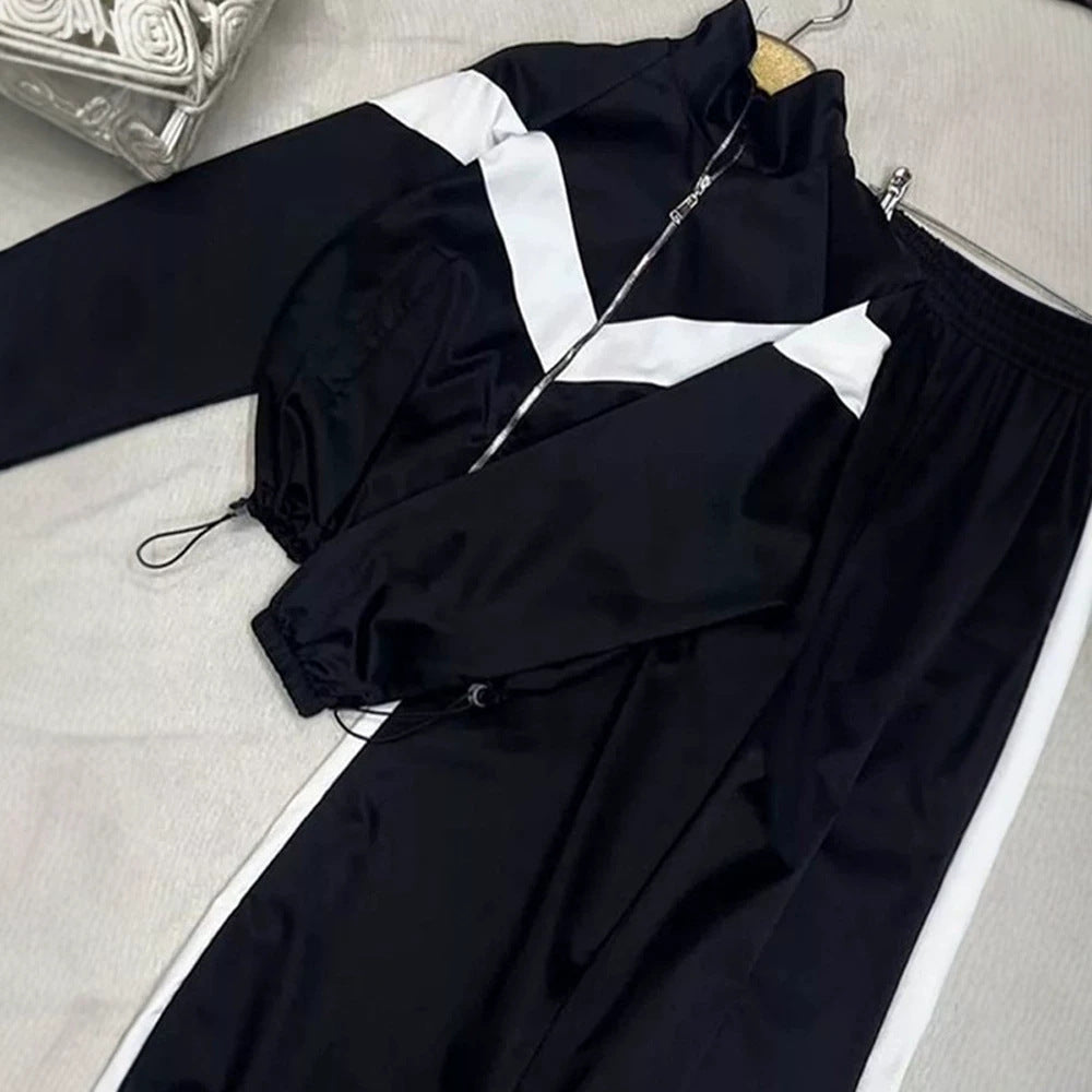 Damen Retro-Trainingsanzug mit Reißverschlussjacke und elastischer Bundhose Echoarchiv