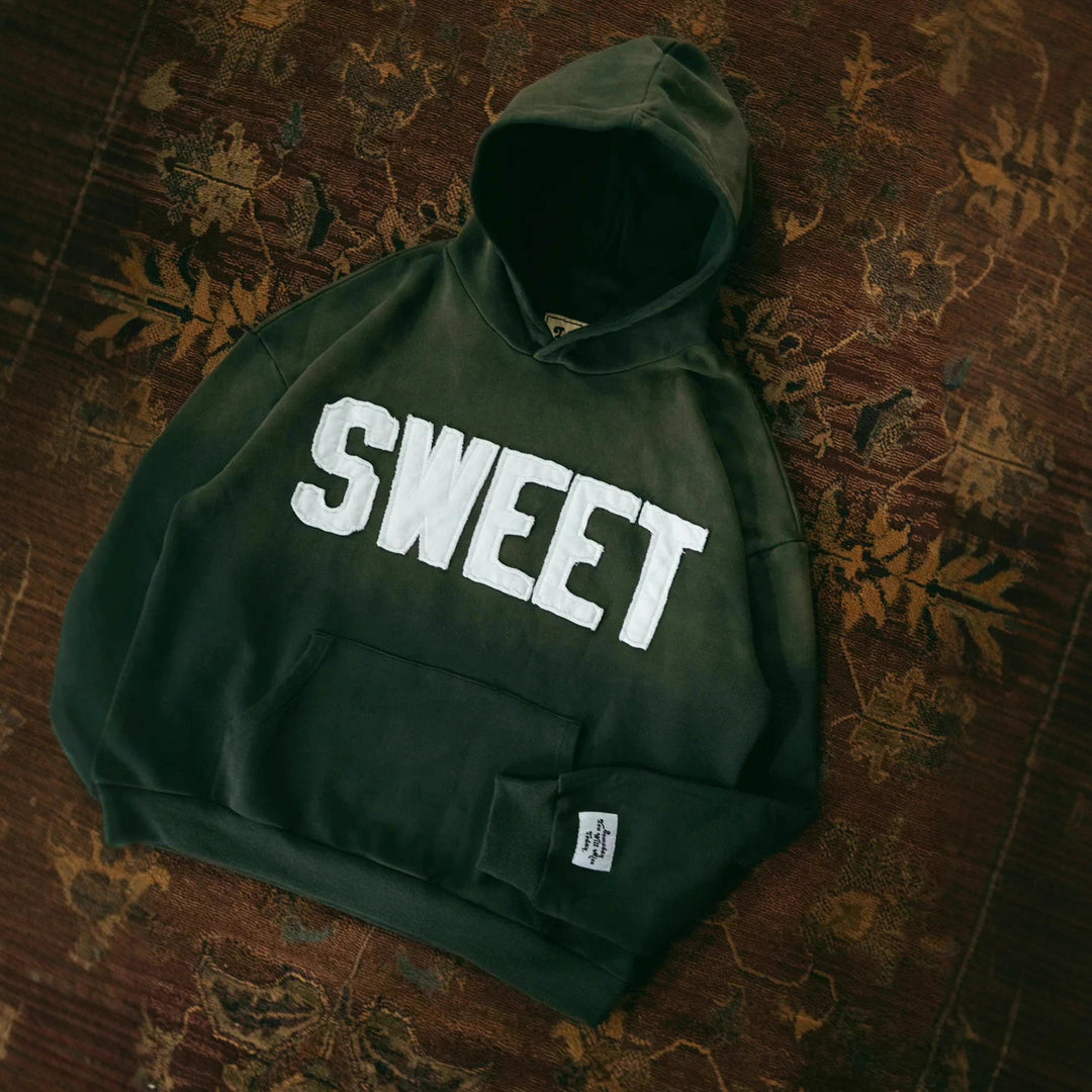Unisex nan weit geschnittener Kapuzenpullover mit aufgesetzten Buchstabenapplikationen und Kängurutasche Echo Archiv