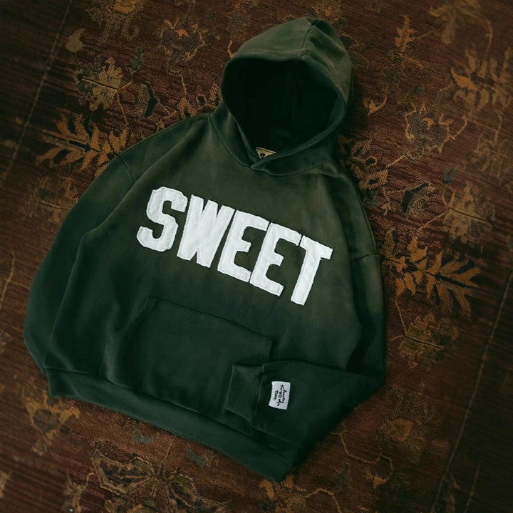 Unisex nan weit geschnittener Kapuzenpullover mit aufgesetzten Buchstabenapplikationen und Kängurutasche Echo Archiv