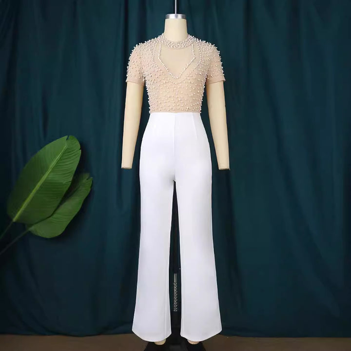 Damen eleganter Jumpsuit mit glitzernden Perlenakzenten Echo Archiv