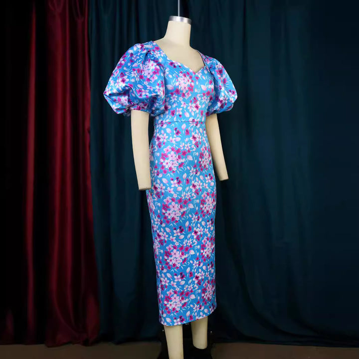 Damen Elegantes Kleid mit voluminösen Puffärmeln und floralem Muster Echo Archiv