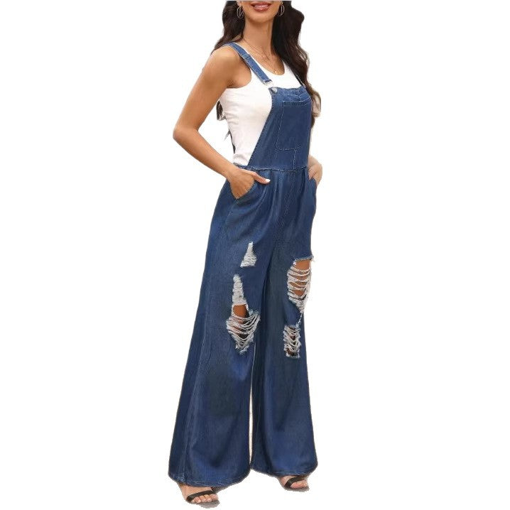Damen weite Distressed-Latzhose mit verstellbaren Trägern und großen Knie-Rips Echo Archiv