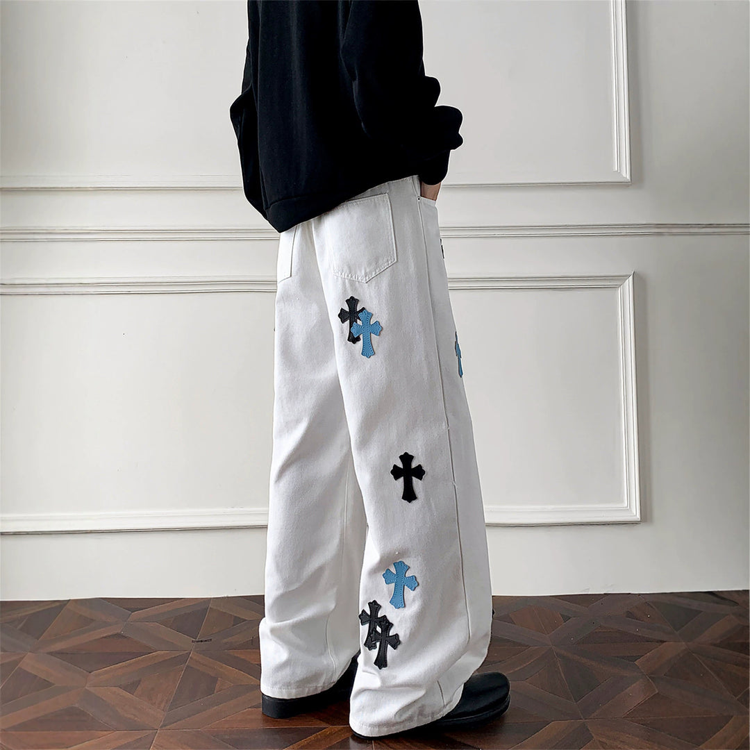 Damen Weitgeschnittene Denim-Hose mit kreativem Kreuzdesign Echoarchiv