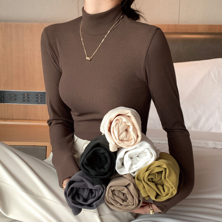 Damen Elegantes und figurbetontes Langarm-Rollkragenoberteil Echo Archiv