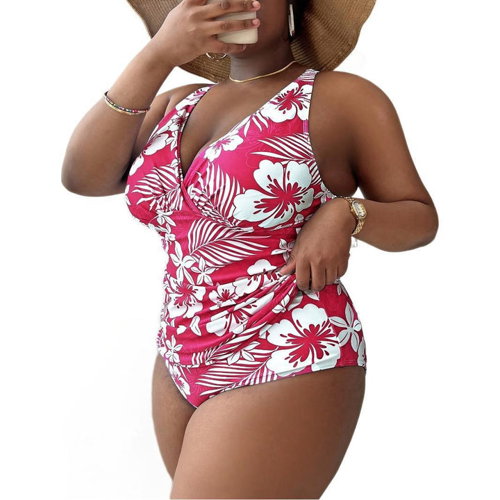 Damen Eleganter Einteiler Badeanzug mit floralem Wickeldesign Echo Archiv
